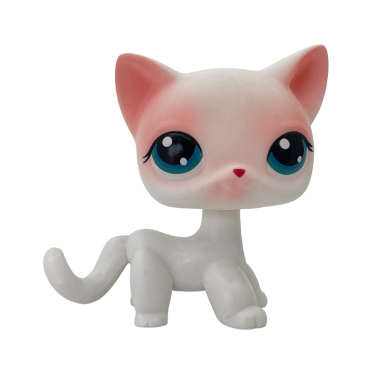A white and pink cat bobble head figurine with large blue eyes.