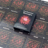 A black oracle deck featuring cards with messages about love, confession, silence, and doubt.
