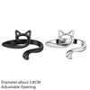 Silver and black adjustable cat-ear crochet rings shown from the side.