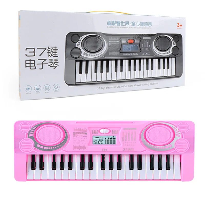 A pink 37-key electronic musical keyboard with a microphone is shown in a box and as a standalone product.