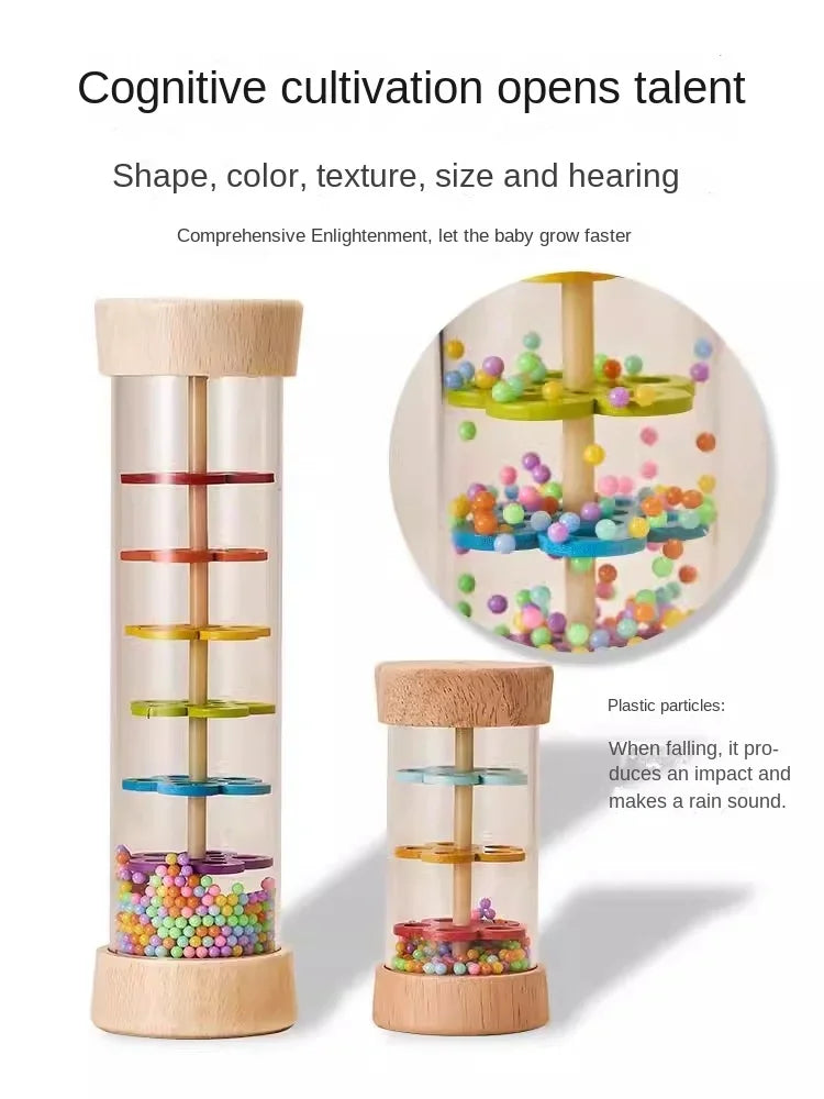 A wooden cylinder toy with colored plastic balls inside, designed to make a rain sound for early learning.