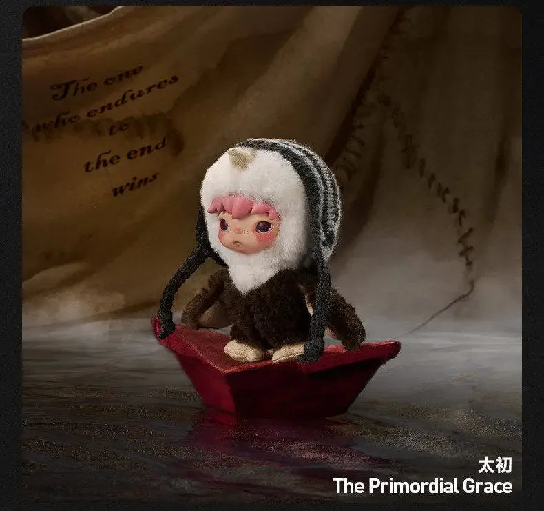 A plush doll resembling a creature with white fur and black stripes sits on a red tray against a dark background.