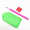 A pink ergonomic drill pen and a red square tool for diamond painting