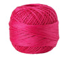 A ball of bright pink crochet thread used for tatting and embroidery.