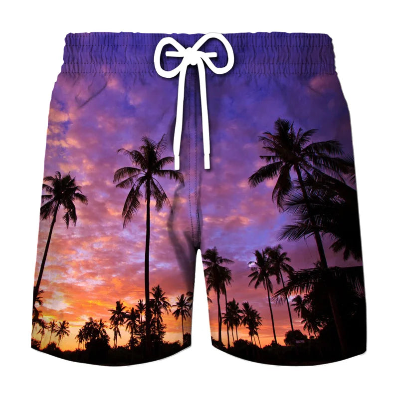 Men's beach swim shorts with a tropical coconut tree print against a sunset sky.