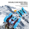 A blue and black double-side body roll walking stunt RC car navigating a snowy mountain landscape.