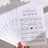 A bingo card for a bridal shower game titled Find the Guest Bingo featuring various characteristics like wearing a new dress 