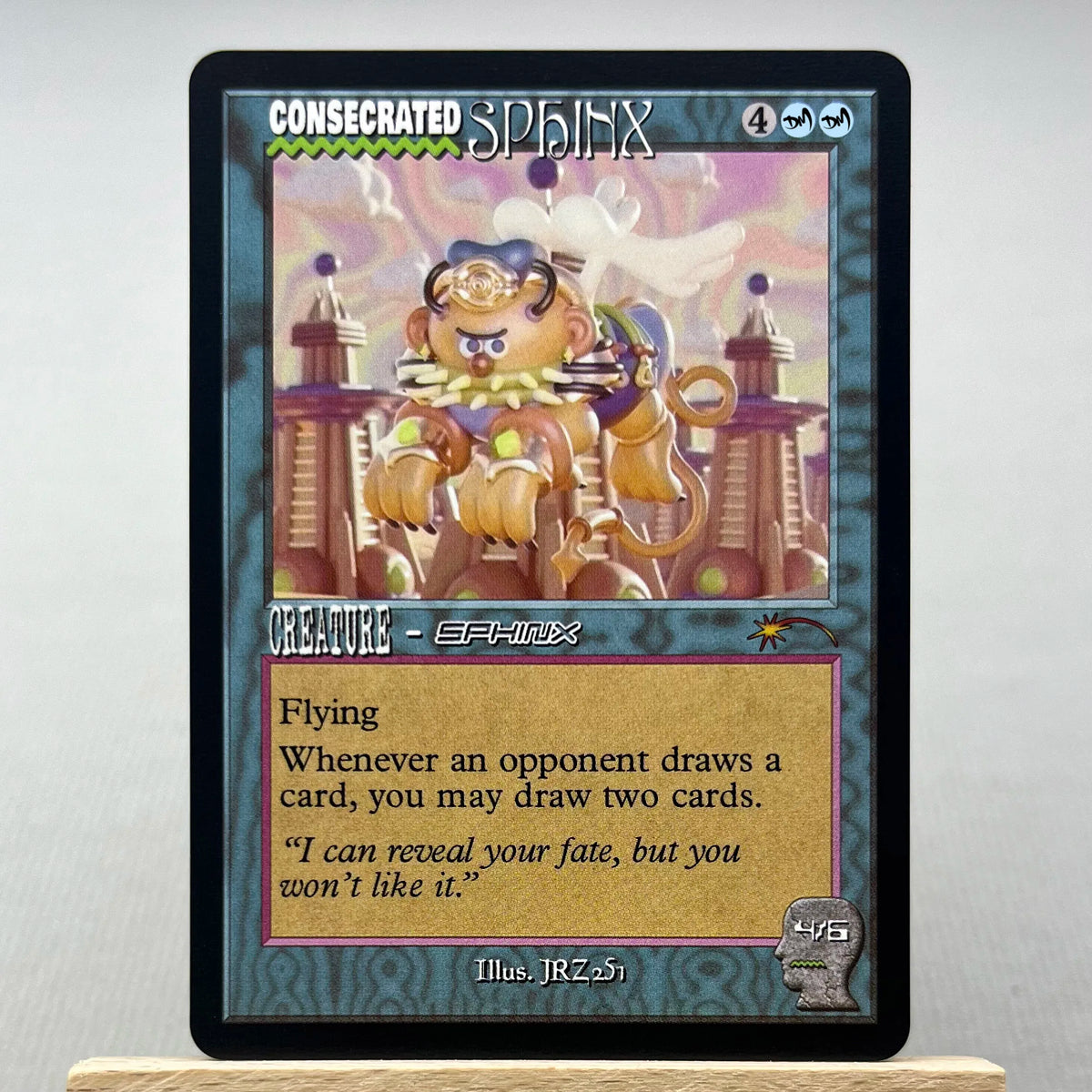 A Magic: The Gathering card featuring the creature Sphinx with flying ability and a text box.
