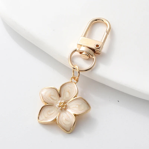 Floral Enamel Keychains with Vibrant Plant Designs