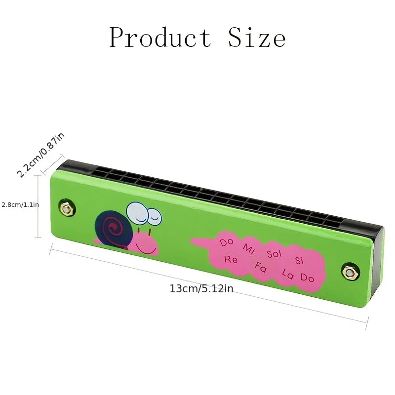A green wooden harmonica with a cartoon animal design showing musical notes on the body.
