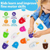 A child is sorting various colored and shaped plastic toys, including letters and animals, for fine motor skill development.