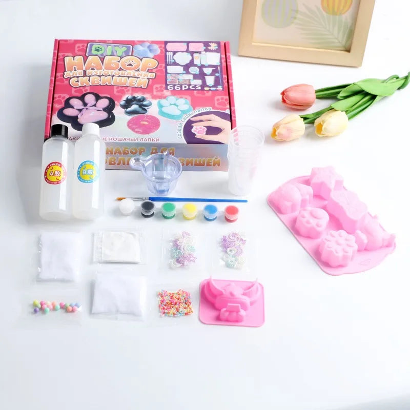 A box of a DIY squishy making kit containing liquid gel, silicone molds, and various squishy components.