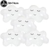 Five white cloud-shaped foil balloons for birthday party decor
