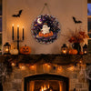 A Halloween diamond painting hanging ornament kit featuring a white ghost on a pumpkin surrounded by stars and bats, displaye