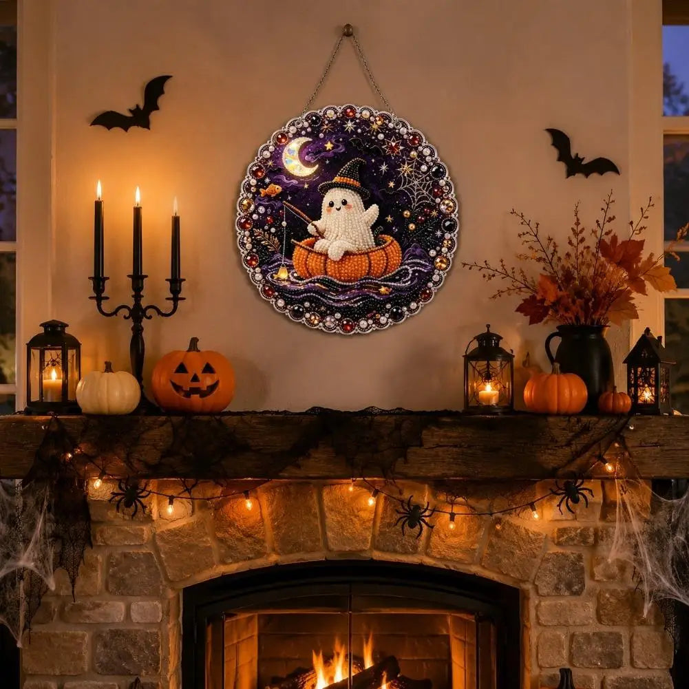 A Halloween diamond painting hanging ornament kit featuring a white ghost on a pumpkin surrounded by stars and bats, displaye