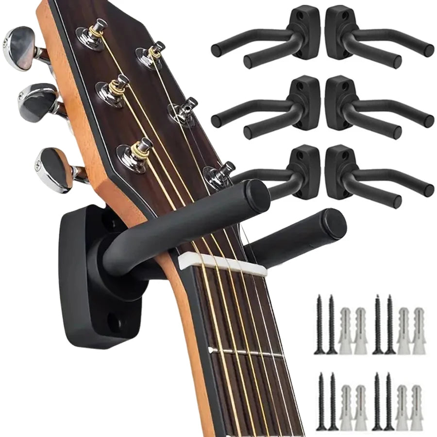 Wall-mounted guitar holder with non-slip cradle showing the neck and tuning pegs.