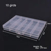 A rectangular clear plastic storage box with 10 individual compartments for organizing small items.