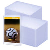A stack of clear PVC trading card sleeves with a single soccer ball card displayed on the top sleeve.