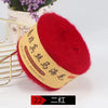A bright red ball of mohair yarn labeled with Chinese and English text, used for knitting projects.