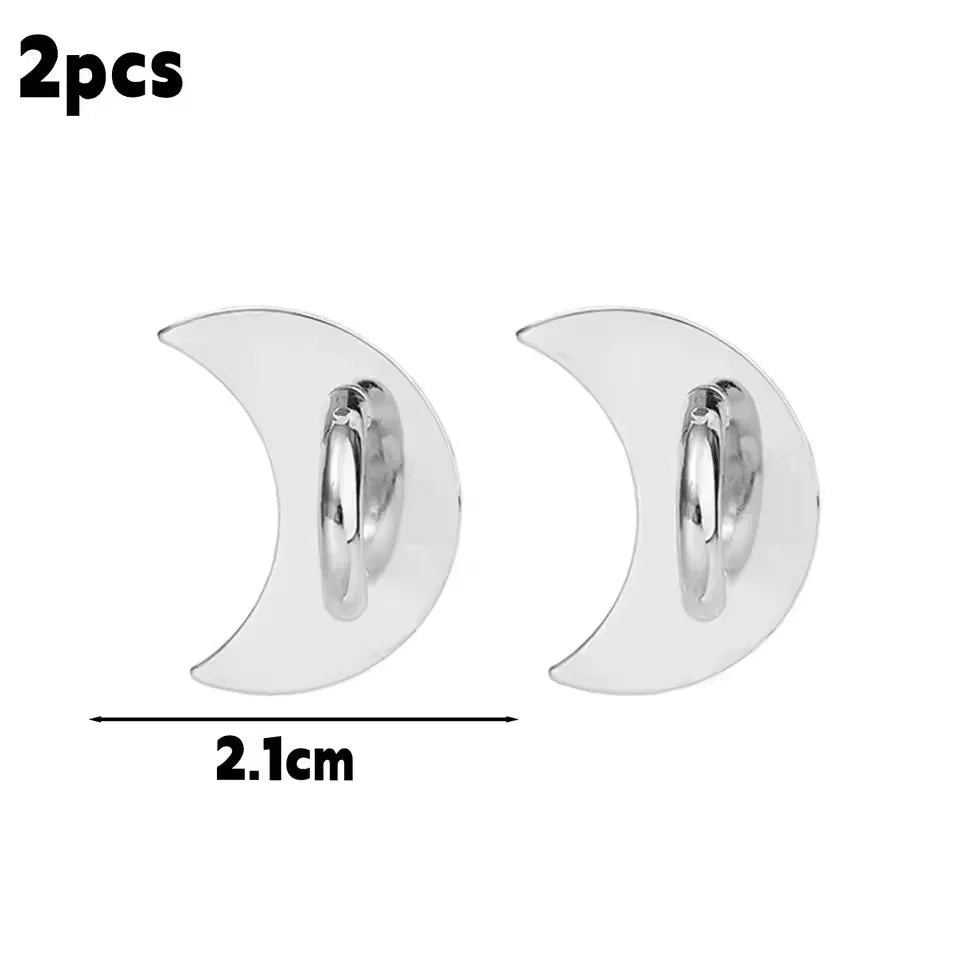 Two clear decorative phone charm hooks with adhesive backing, measuring 2.1cm each.
