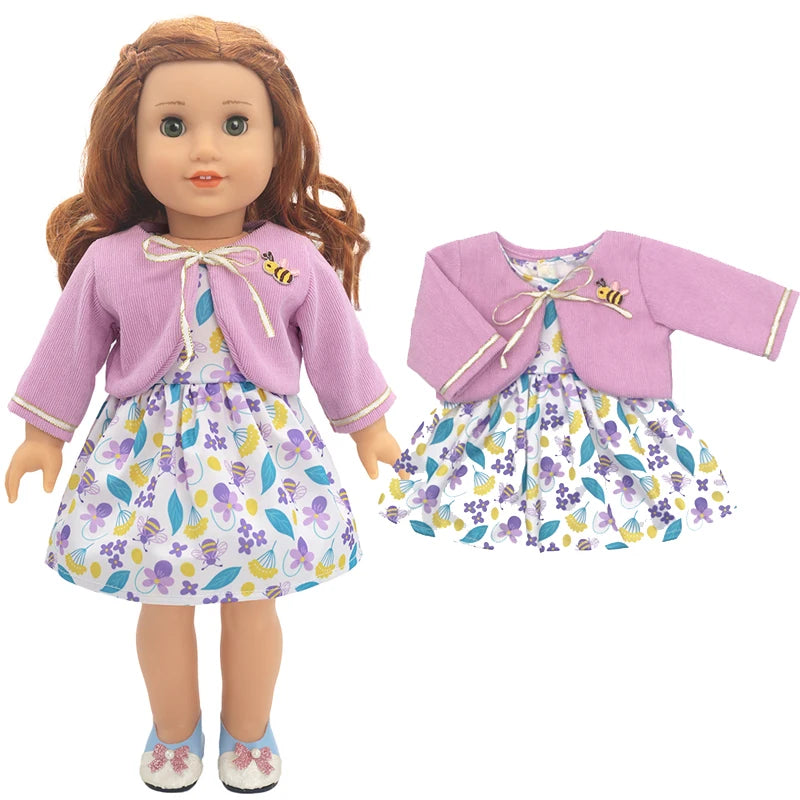 A doll wearing a purple cardigan, floral skirt, and matching shoes.