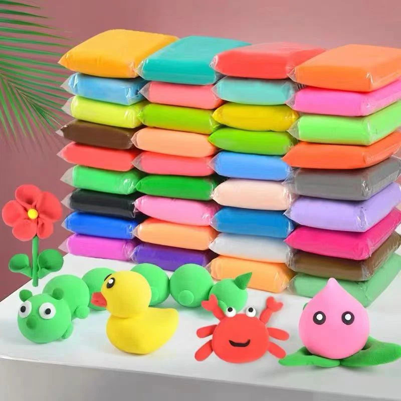A stack of colorful air-dry modeling clay blocks and tools for creative kids
