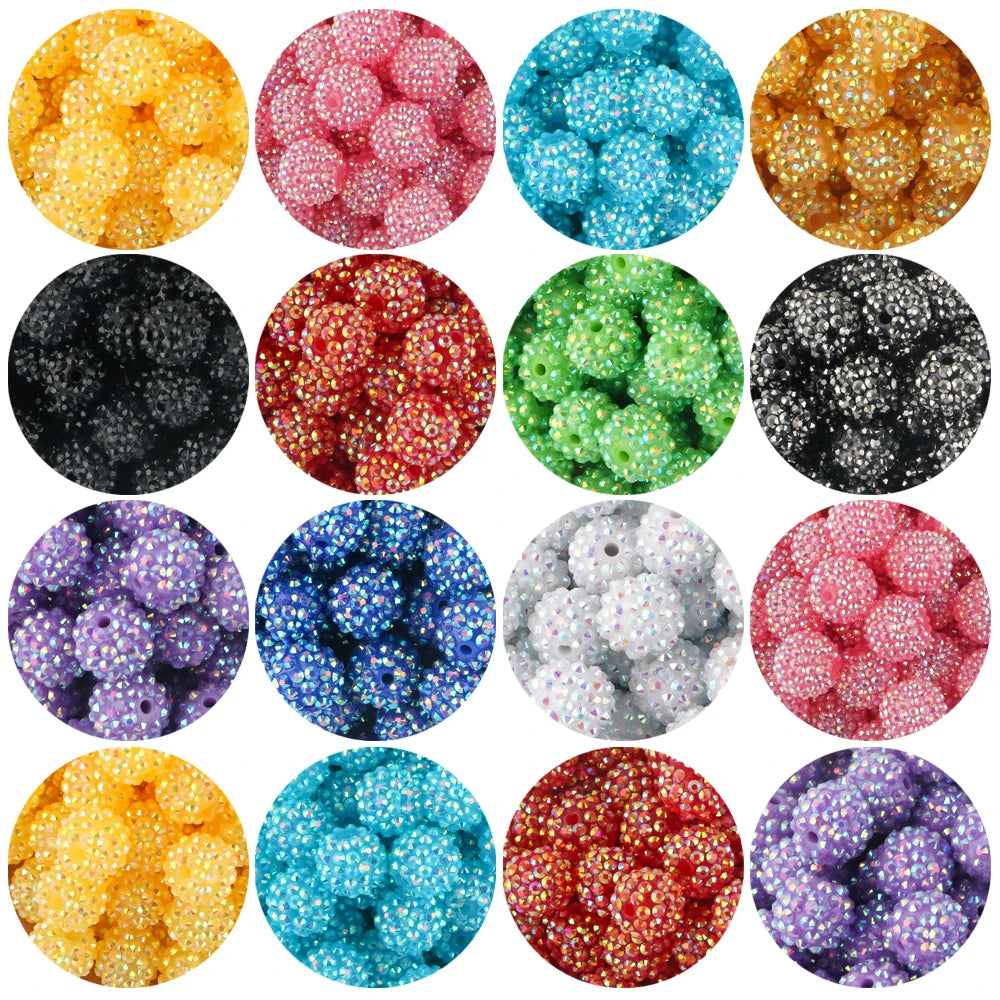 A collection of colorful rhinestone resin bayberry beads for jewelry making in various shades and textures.