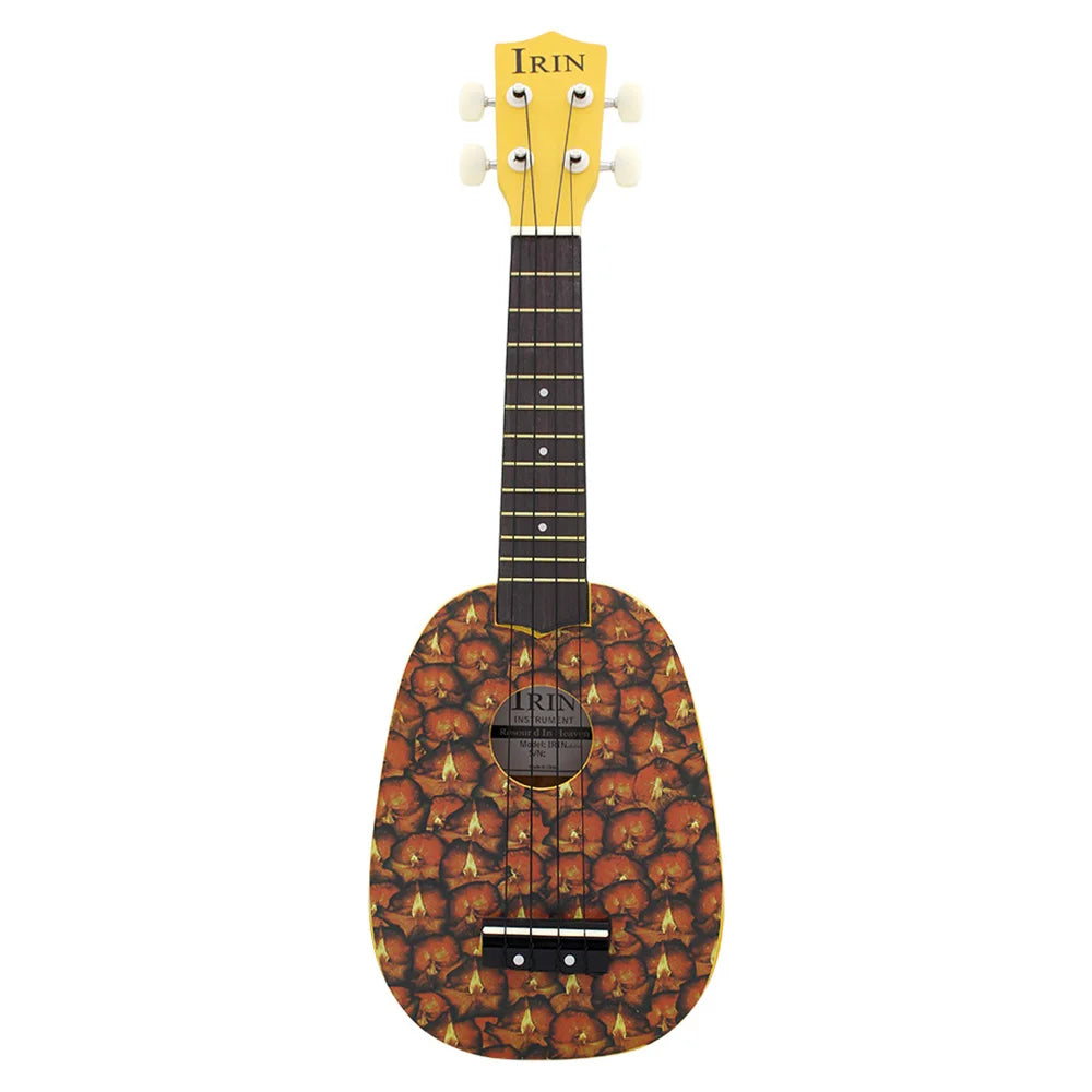 A yellow and black ukulele featuring a body decorated with an orange and brown tropical leaf pattern.
