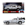 A diecast collectible model of a white Ford Explorer tour vehicle from Jurassic Park, featuring a removable roof section.