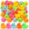Assorted mini silicone rubber ducks in various bright colors for bath and play