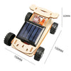 A wooden model kit of a solar-powered lunar rover featuring wheels and a solar panel.