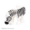 White zebra building block figure with black stripes