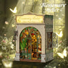 A detailed miniature wooden book nook kit featuring an arched window and interior scene for dollhouse décor.