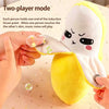 Two players touching an induction point on a plush toy to make music notes play