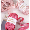A set of nine-color satin ribbon yarn for hand weaving and bag making shown with finished ribbons.