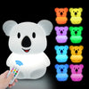 A white koala LED night light is shown with multiple colored light options and a remote control.