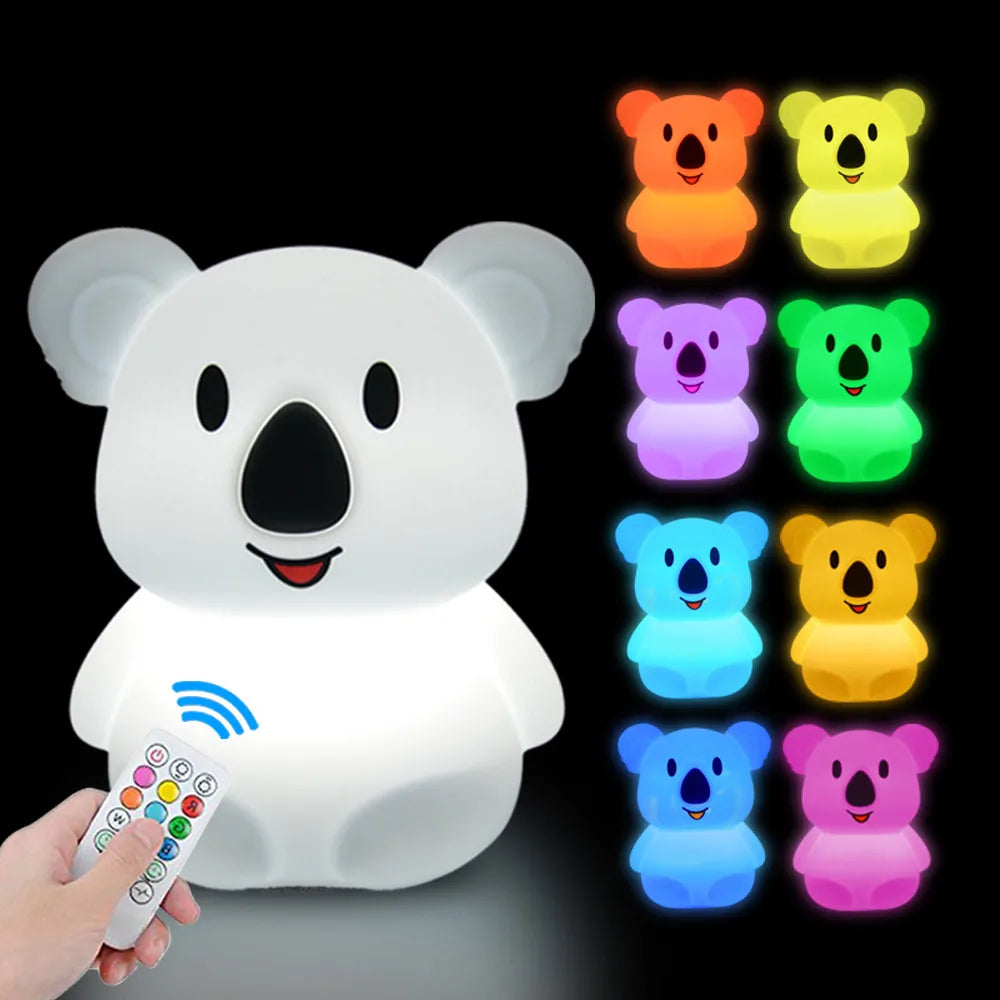 A white koala LED night light is shown with multiple colored light options and a remote control.