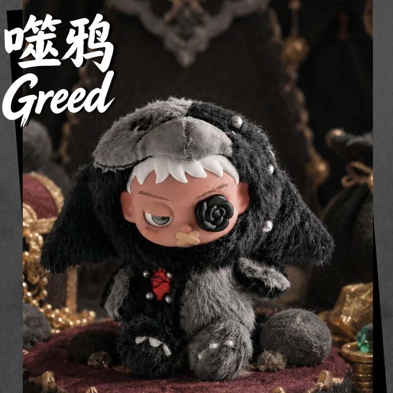 A dark, fuzzy creature figure named Greed with gray and black fur sitting on a reddish surface.