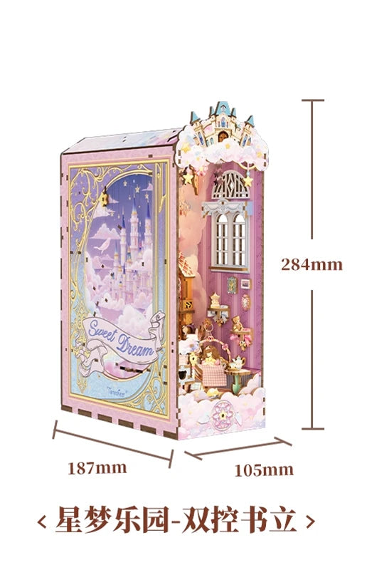 A pink wooden puzzle kit resembling a castle with a detailed interior scene and decorative elements.