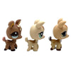 A set of three Bobbing Deer bobblehead toys in brown and tan colors.