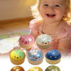 A collection of colorful squishy stress relief toys shaped like dumplings, including pink, green, blue, and gold varieties.