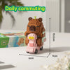 A brown capybara building block model kit is shown on a white surface with a green background and daily commuting text.
