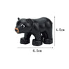 A black plastic zoo animal building block shaped like a bear.