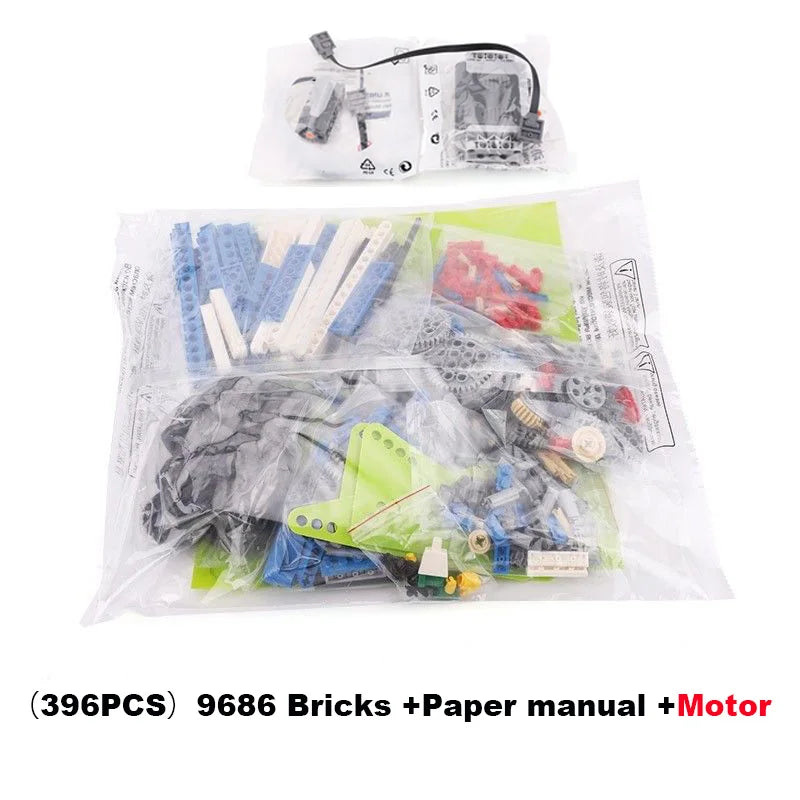 A plastic bag containing a set of 9686 bricks, a paper manual, and a motor for building blocks.