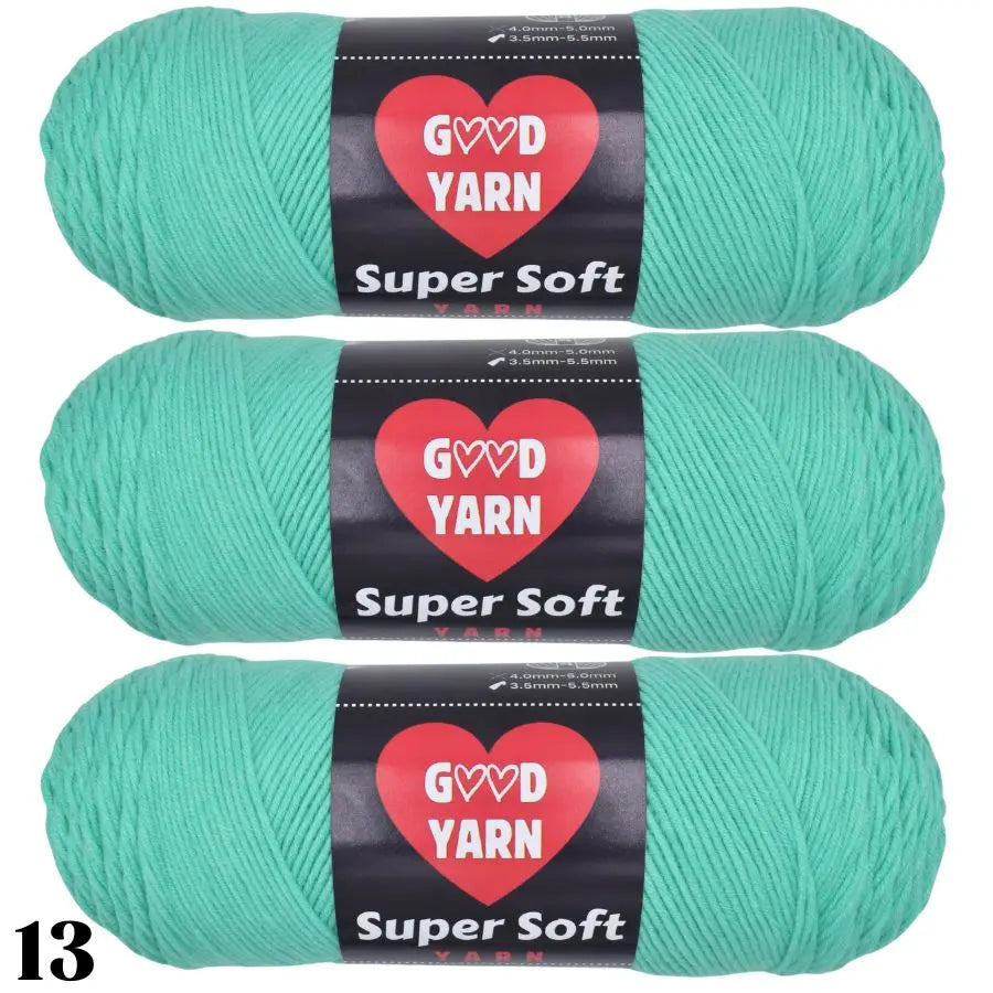 Three skeins of Super Soft green acrylic yarn labeled GOVD YARN for crochet and knitting