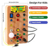 A wooden busy board for kids featuring various switch controls and interactive elements with attached wires.