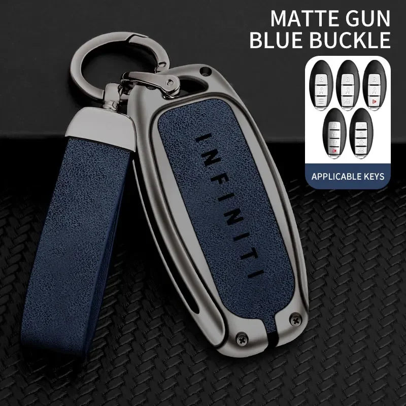 A matte blue buckle key case cover with a silver finish and a leather strap, shown against a black background.