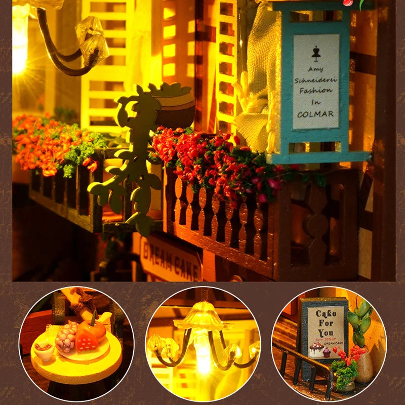 A miniature wooden dollhouse kit featuring furniture displayed in a warm, illuminated setting.