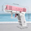 A pink and white tactical water blaster pistol is shown with various dimensions.