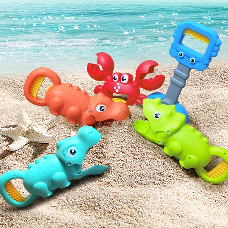 A set of colorful beach toys including a red crab, a blue dinosaur, and a green dinosaur with claw pliers.
